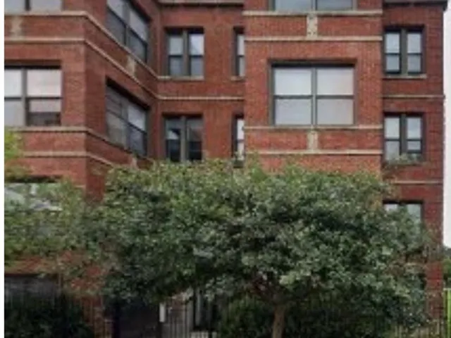 a front view of a multi story residential apartment building