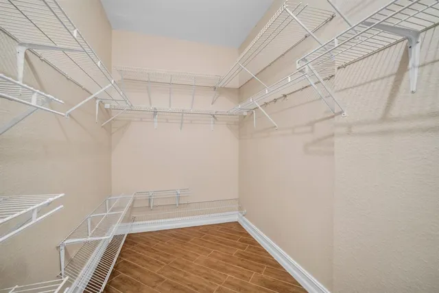 a view of a room with racks on the wall