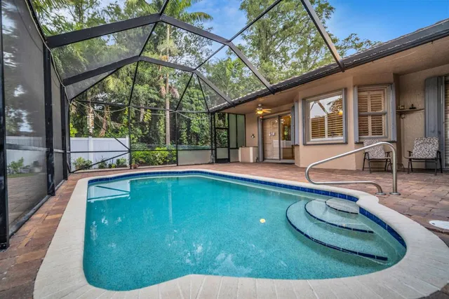 a view of indoor pool and deck
