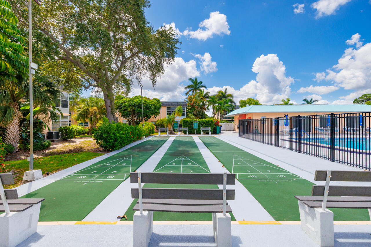 2950 Southeast Ocean Boulevard, Unit 533 Stuart, FL 34996 - Photo 26 of 34 a view of a house with a yard