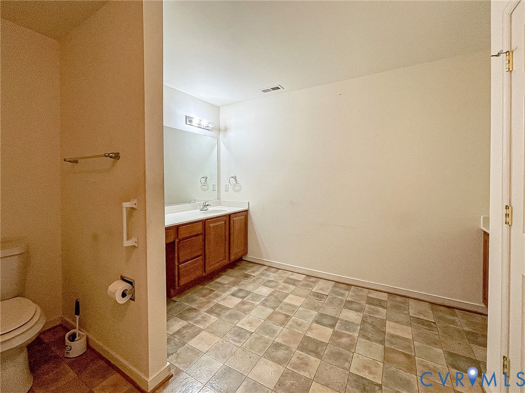 59 Taylor Farms Road Kenbridge, VA 23944 - Photo 20 of 50 a bathroom with a sink toilet and shower