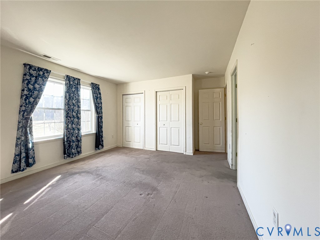 59 Taylor Farms Road Kenbridge, VA 23944 - Photo 22 of 50 an empty room with windows