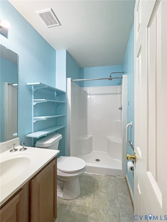 59 Taylor Farms Road Kenbridge, VA 23944 - Photo 36 of 50 a bathroom with a sink a toilet and shower