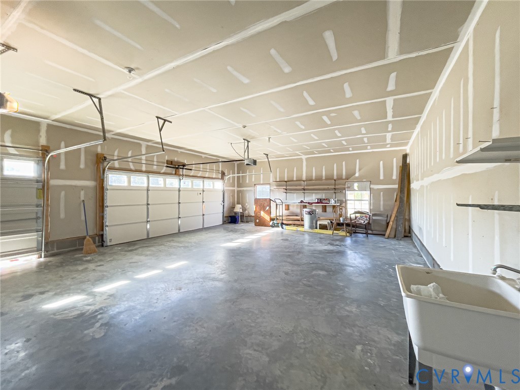 59 Taylor Farms Road Kenbridge, VA 23944 - Photo 40 of 50 a view of a garage with storage