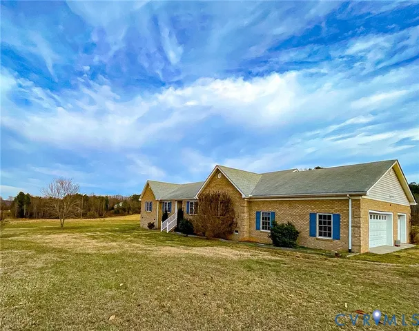 a house view with a garden space