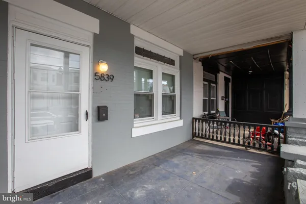 a view of a porch of a house