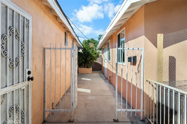 a view of a house with wooden floor and stairs
