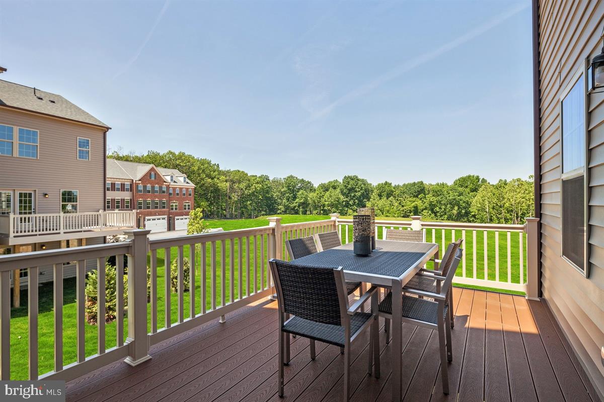 3203 Laurel Hill Road Hanover, MD 21076 - Photo 13 of 21 a view of balcony with furniture and wooden deck