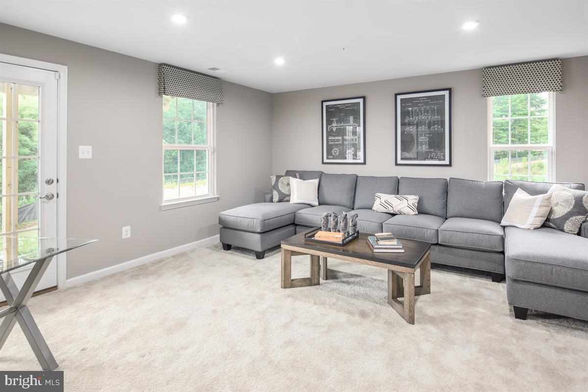 3203 Laurel Hill Road Hanover, MD 21076 - Photo 3 of 21 a living room with furniture and windows
