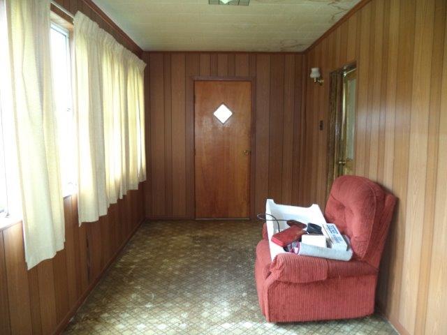 325 Newtown Road Buchanan, VA 24066 - Photo 28 of 39 Enclosed sunporch with backyard access