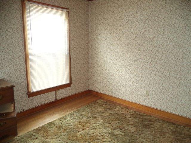 325 Newtown Road Buchanan, VA 24066 - Photo 33 of 39 Upstairs bedroom #2 with hardwood flrs.