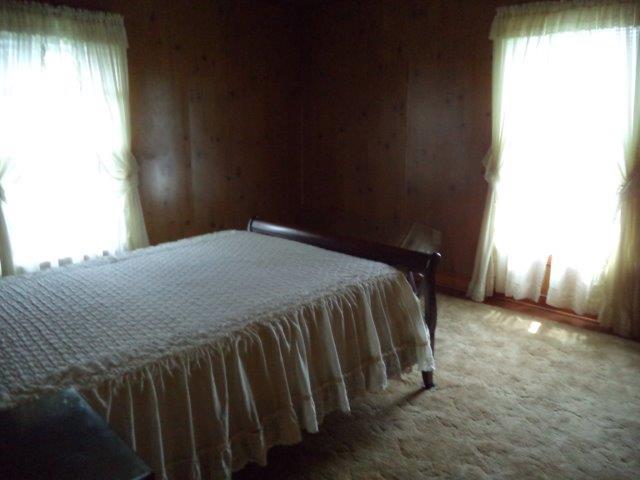 325 Newtown Road Buchanan, VA 24066 - Photo 34 of 39 Upstairs bedroom #3 w/ hardwood floors