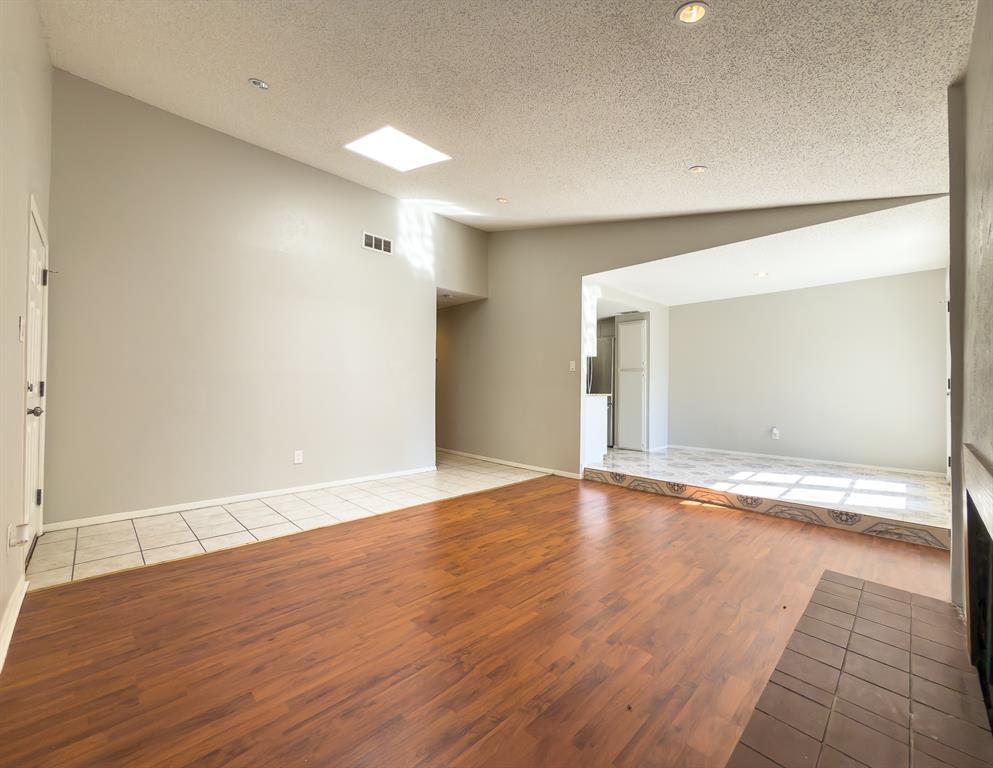 6646 East Lovers Lane, Unit 602 Dallas, TX 75214 - Photo 5 of 19 a view of empty room with wooden floor