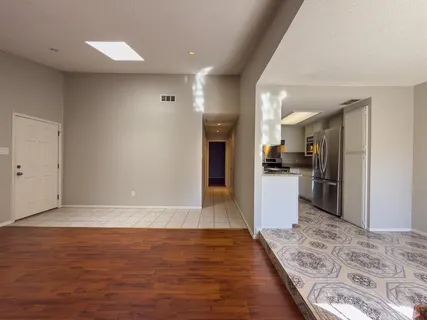 a view of kitchen with wooden floor