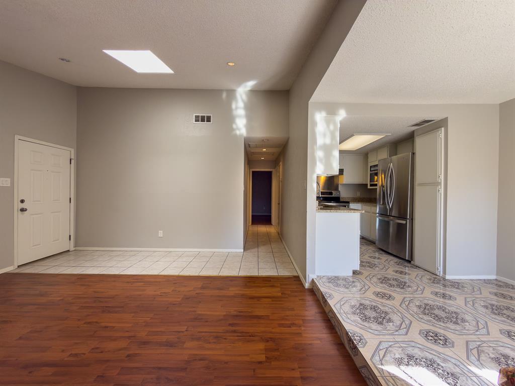 6646 East Lovers Lane, Unit 602 Dallas, TX 75214 - Photo 7 of 19 a view of kitchen with wooden floor