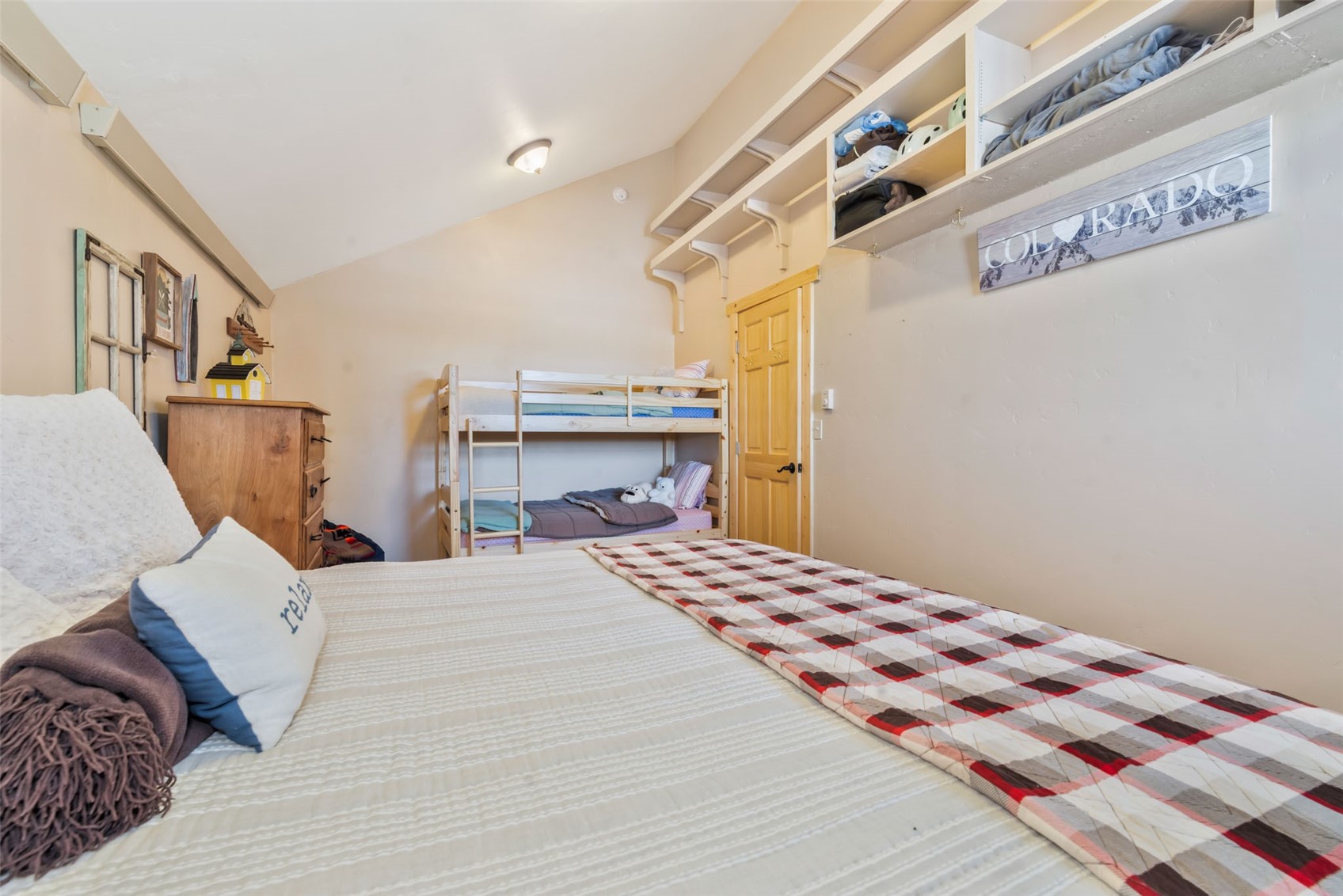 23628 County Road 62 Clark, CO 80428 - Photo 33 of 50 a bedroom with a bed and a lamp