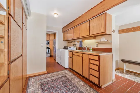 a view of a kitchen with a sink