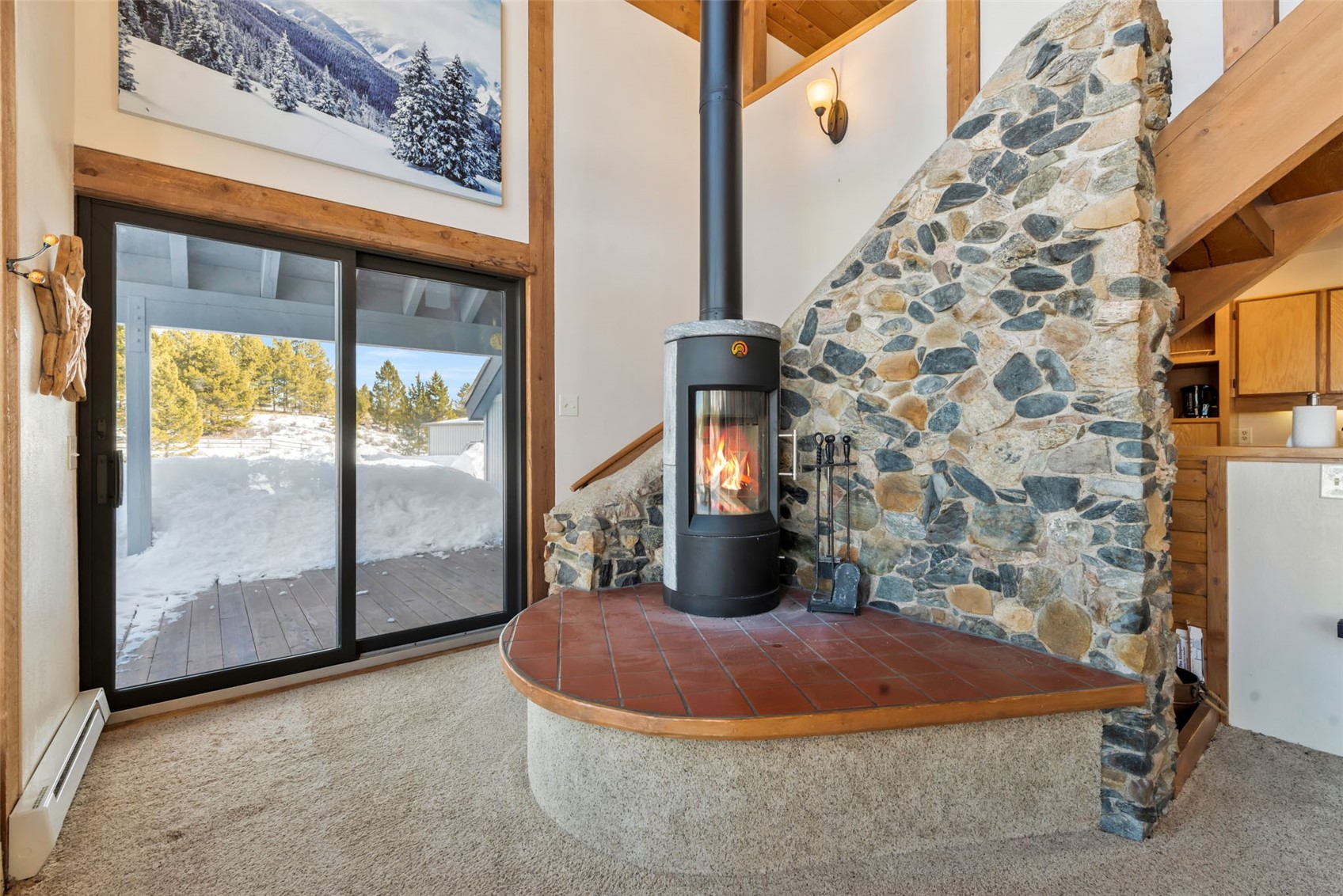 23628 County Road 62 Clark, CO 80428 - Photo 6 of 50 a bedroom with a balcony a bed and a window