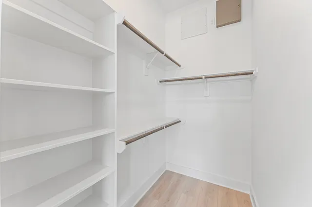 a view of an empty walk in closet