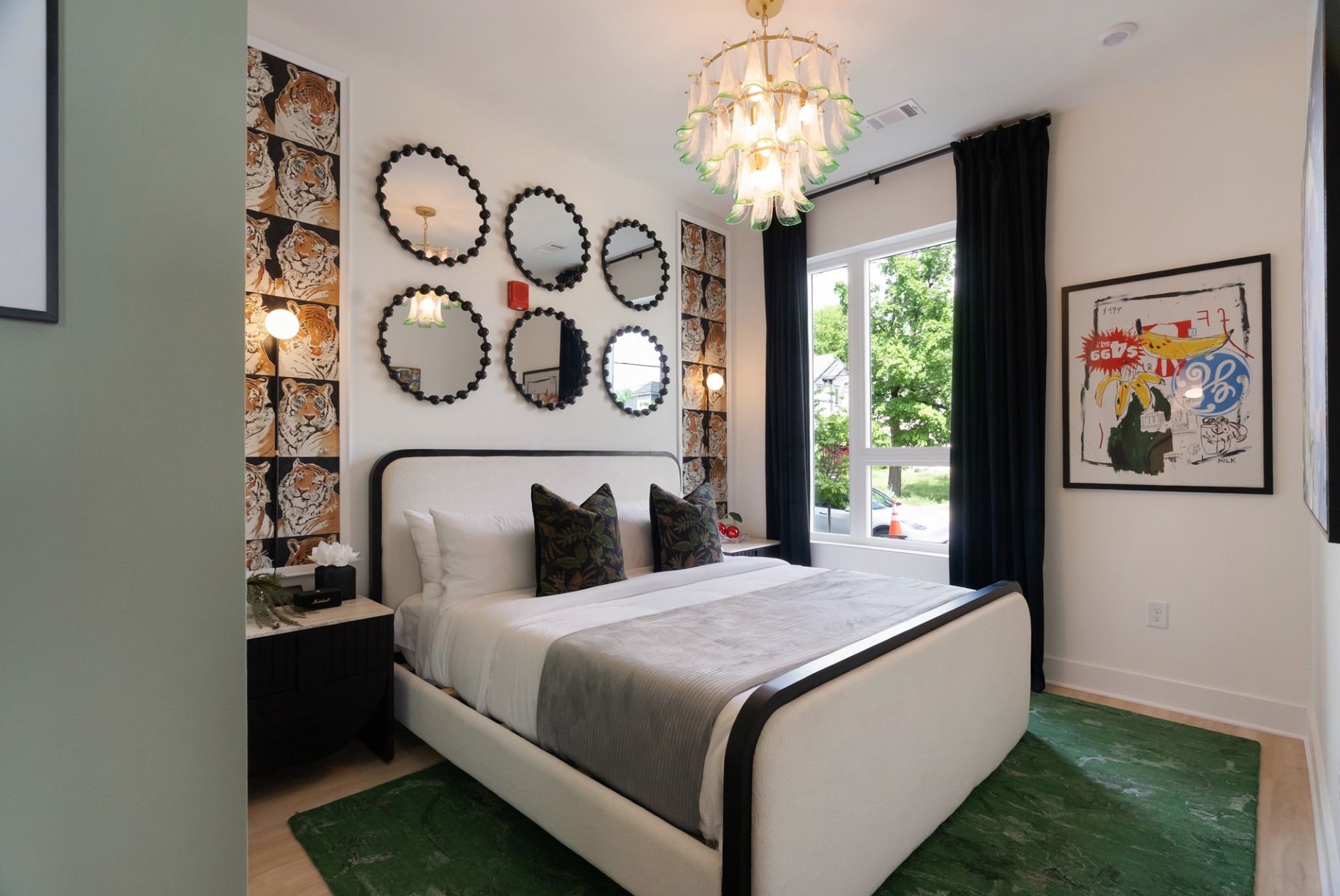 1310 Lischey Avenue, Unit 101 Nashville, TN 37207 - Photo 13 of 32 a bedroom with a large bed and a chandelier