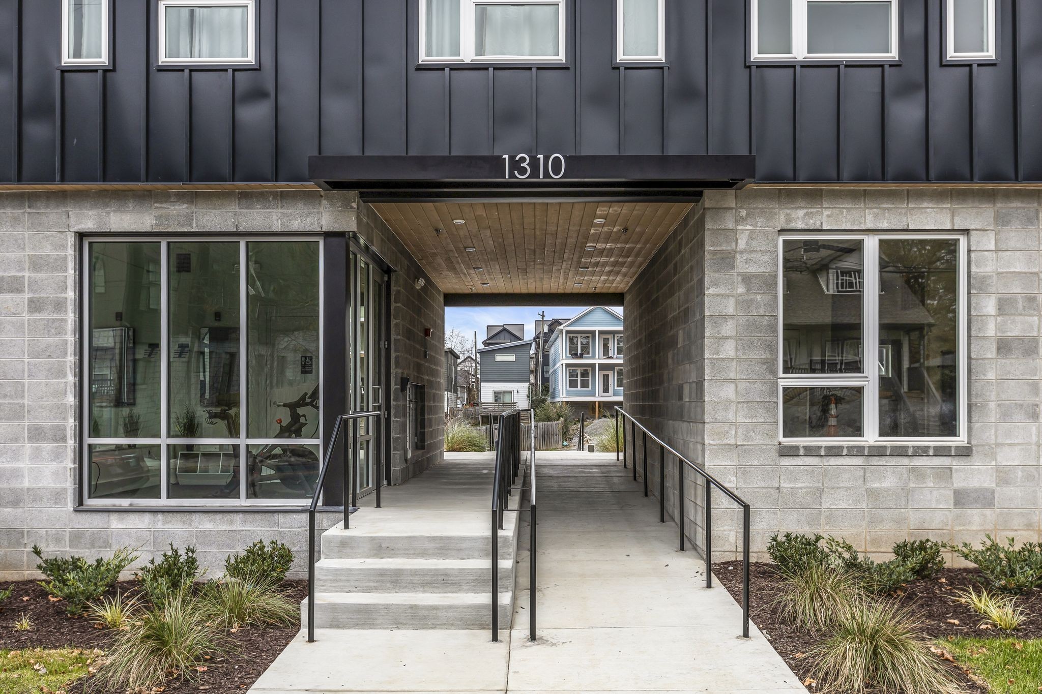 1310 Lischey Avenue, Unit 101 Nashville, TN 37207 - Photo 25 of 32 a front view of a house with a porch