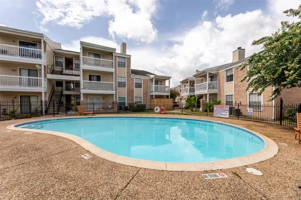 a view of outdoor space yard swimming pool and sitting area