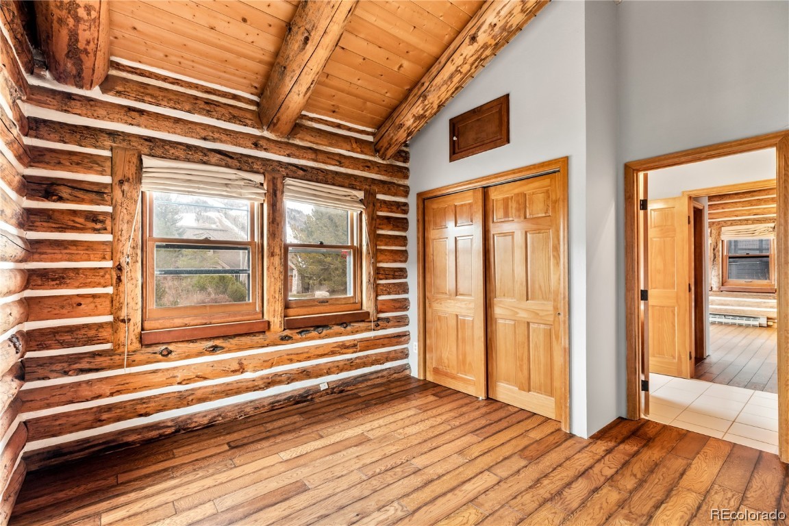 1527 Natches Road Steamboat Springs, CO 80487 - Photo 17 of 50 a view of a room with wooden floor and windows