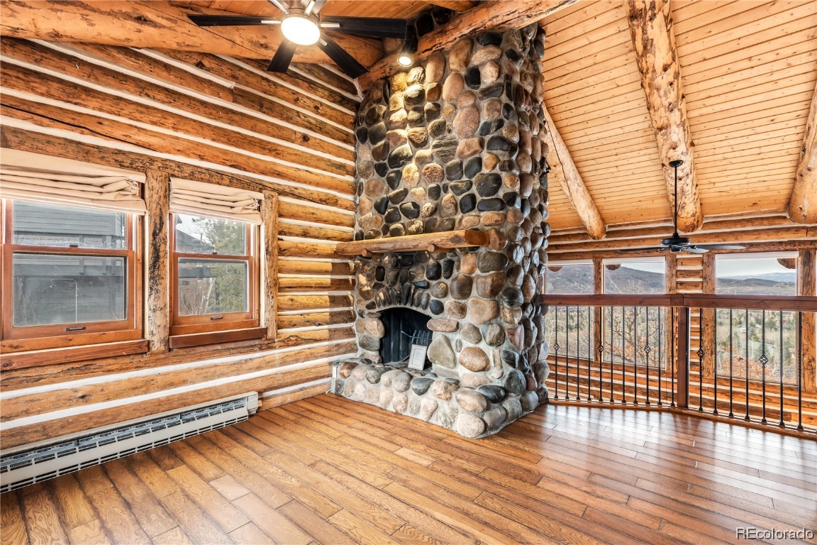 1527 Natches Road Steamboat Springs, CO 80487 - Photo 22 of 50 a view of a living room and a window with wooden floor