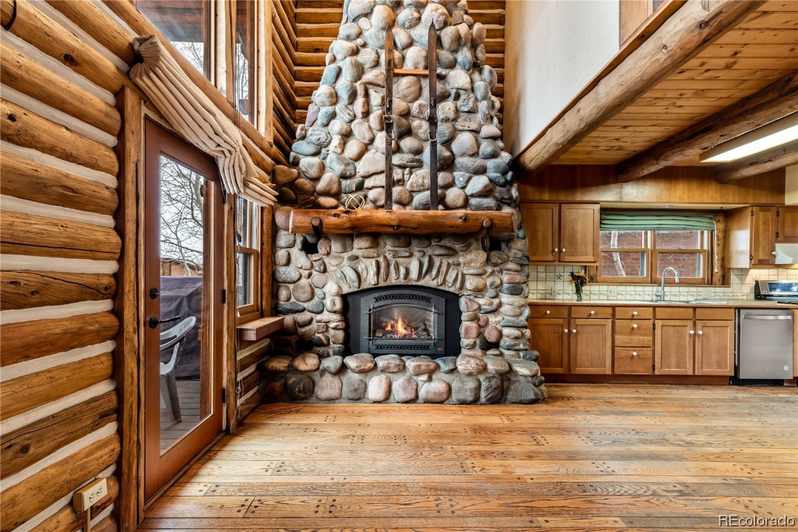 1527 Natches Road Steamboat Springs, CO 80487 - Photo 29 of 50 a living room with furniture and a fireplace