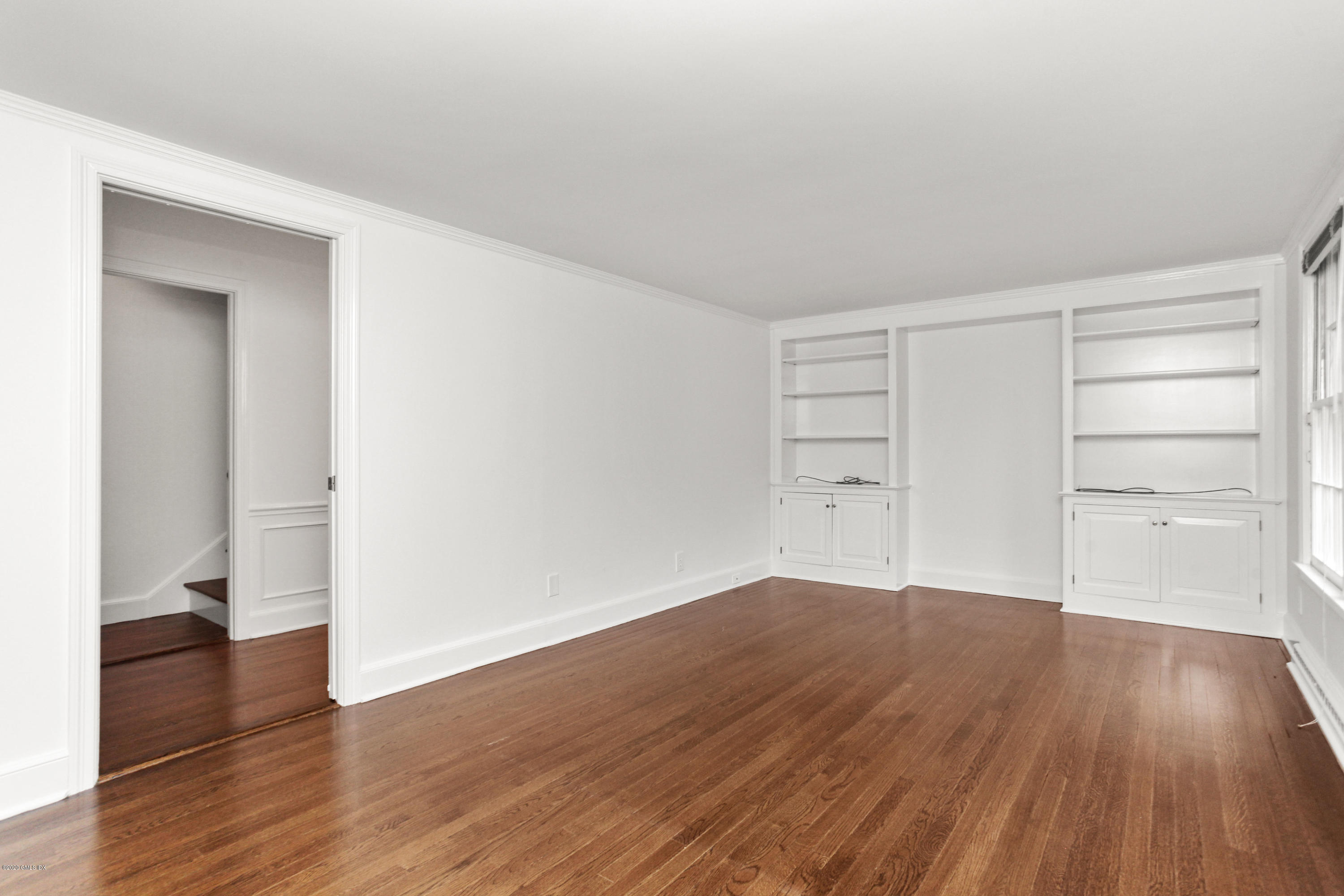 155 Clapboard Ridge Road Greenwich, CT 06831 - Photo 19 of 24 a view of a room with wooden floor