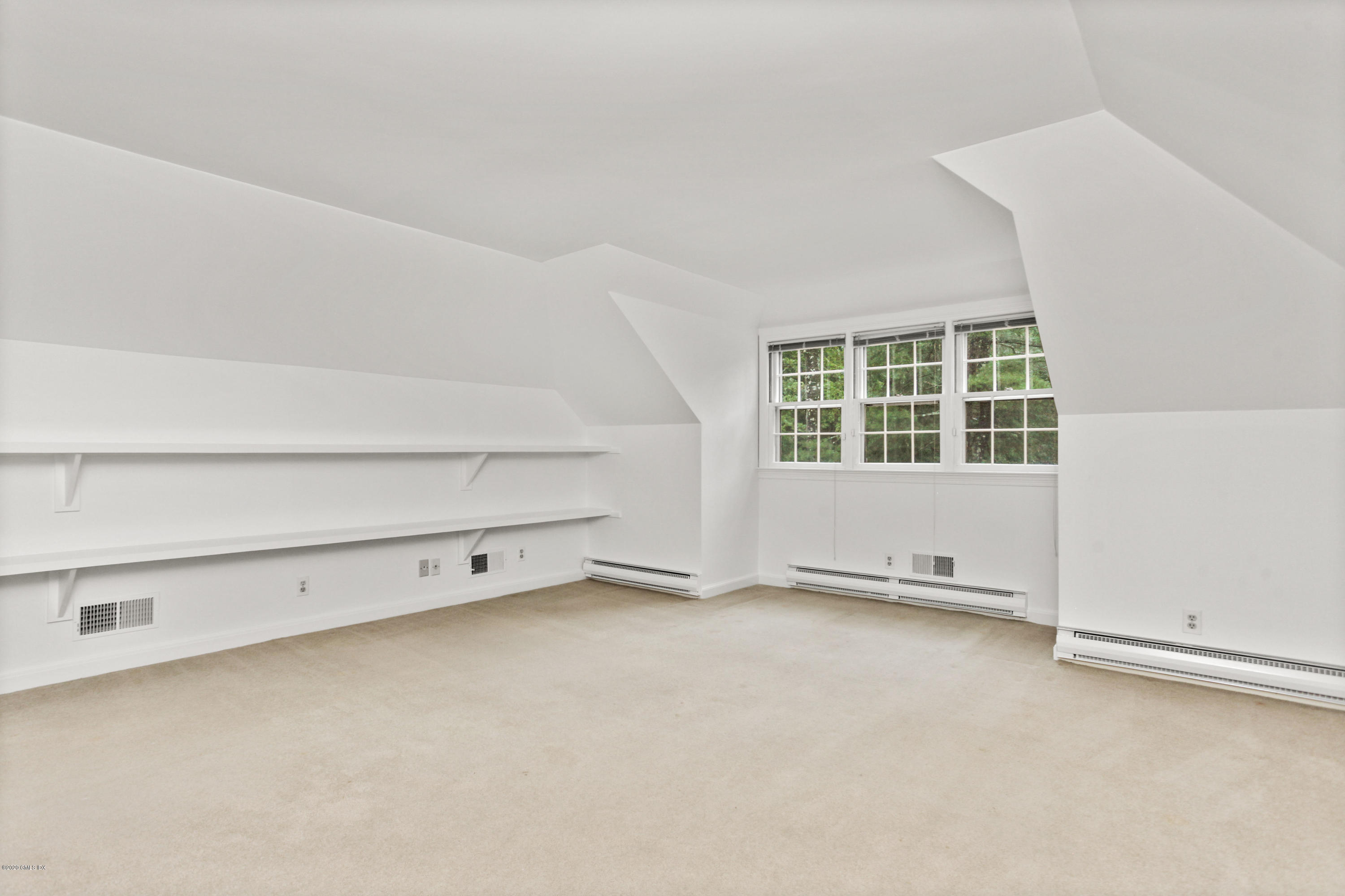 155 Clapboard Ridge Road Greenwich, CT 06831 - Photo 20 of 24 an empty room with windows