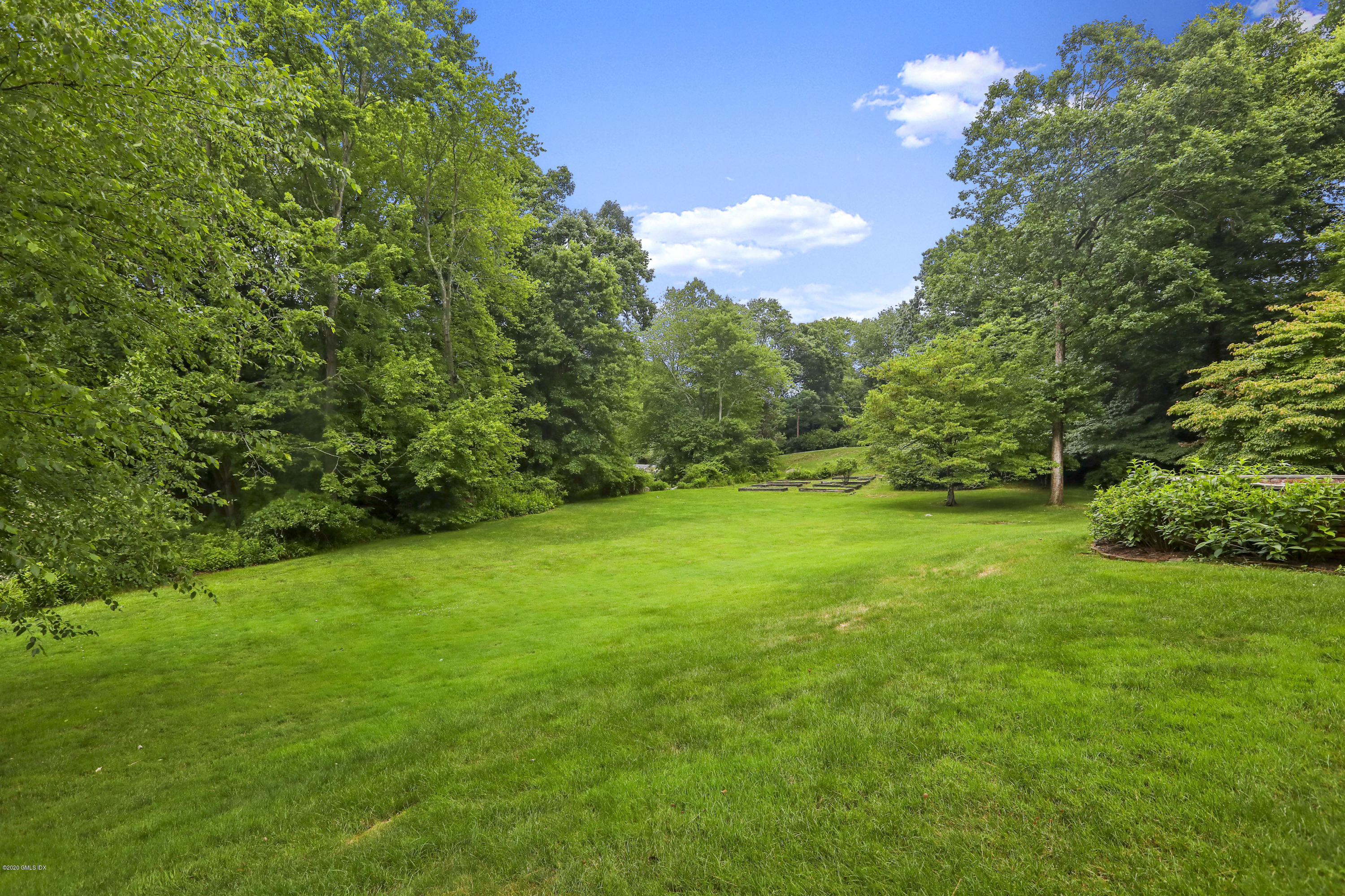 155 Clapboard Ridge Road Greenwich, CT 06831 - Photo 24 of 24 a view of yard with green space