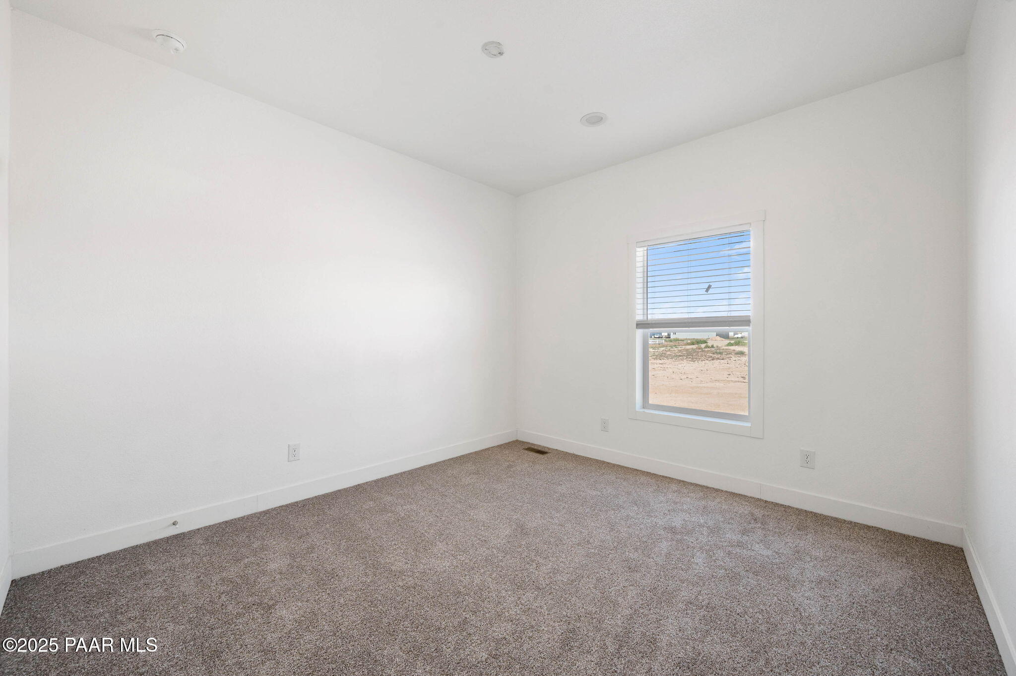 2758 West Altimeter Way Paulden, AZ 86334 - Photo 15 of 24 a view of an empty room and a window