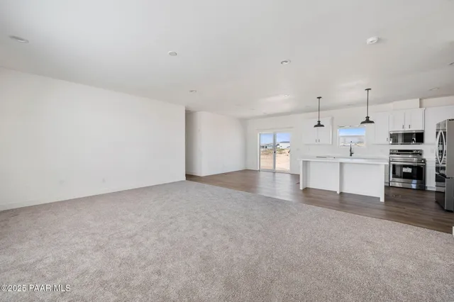 a view of a kitchen with a sink