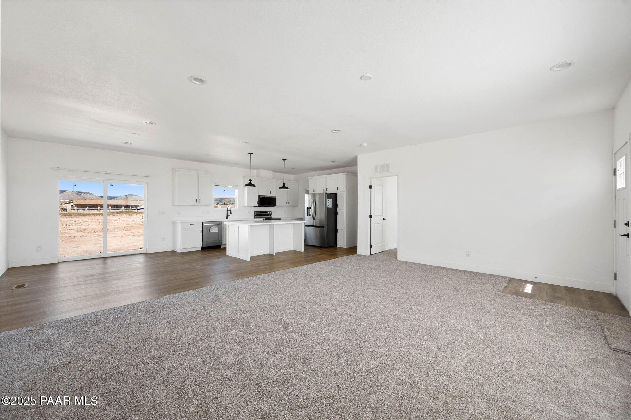 2758 West Altimeter Way Paulden, AZ 86334 - Photo 5 of 24 a view of a kitchen with a sink and a refrigerator