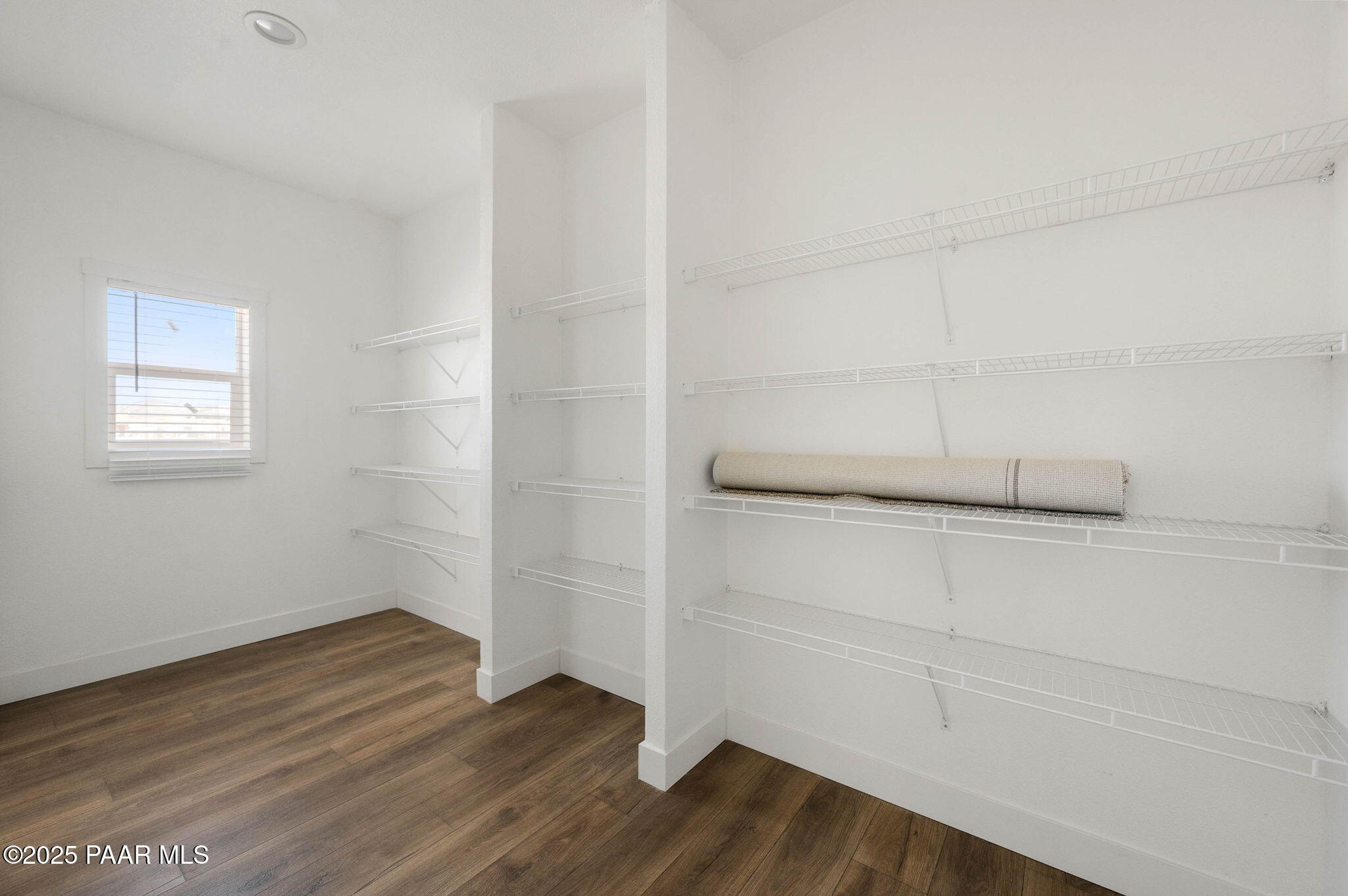 2758 West Altimeter Way Paulden, AZ 86334 - Photo 9 of 24 a view of an empty room and wooden floor