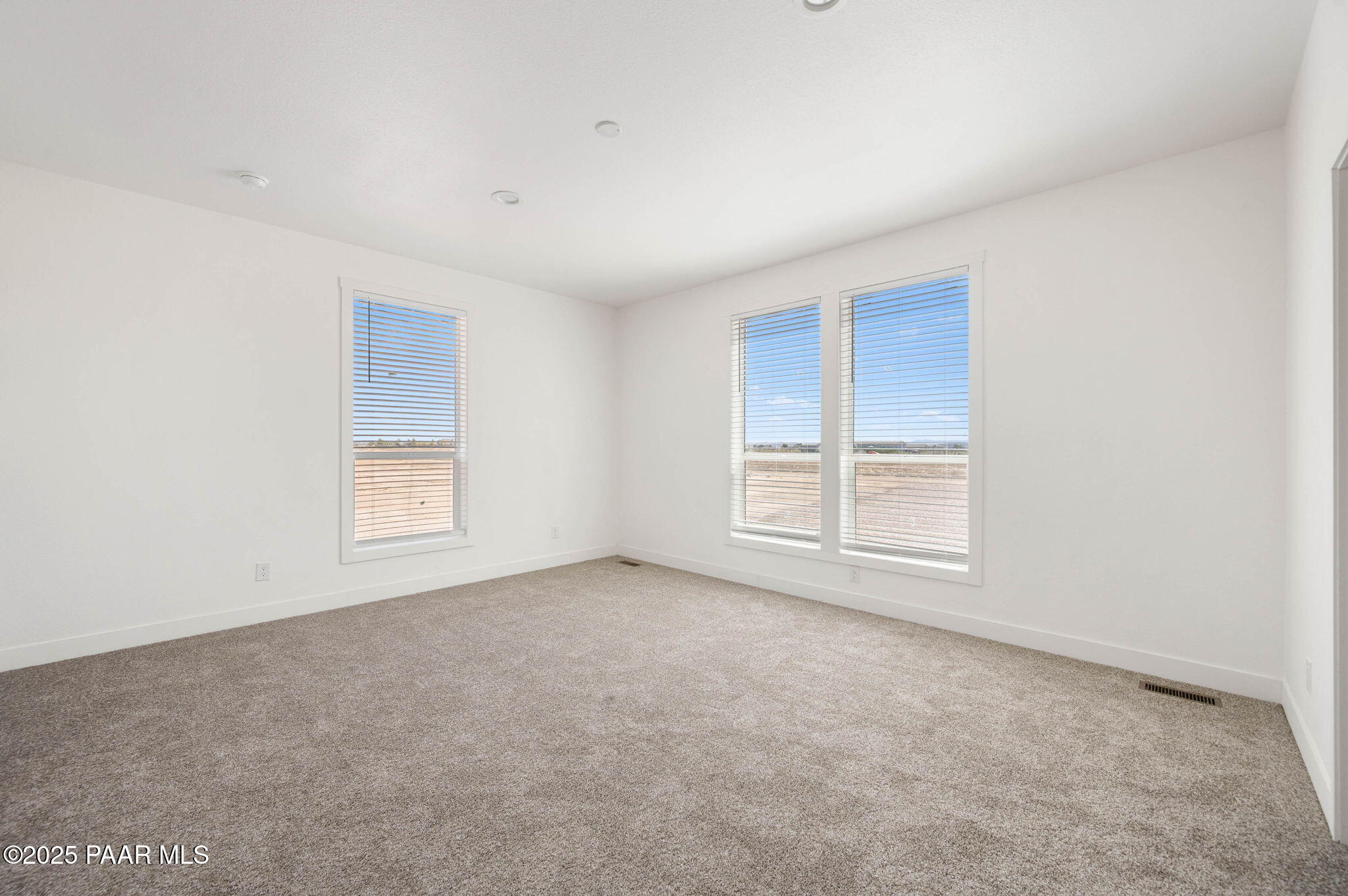 2758 West Altimeter Way Paulden, AZ 86334 - Photo 10 of 24 an empty room with a window