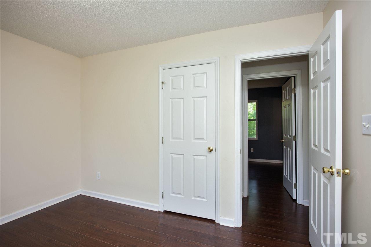 1145 Marlborough Road Raleigh, NC 27610 - Photo 14 of 17 wooden floor in an empty room