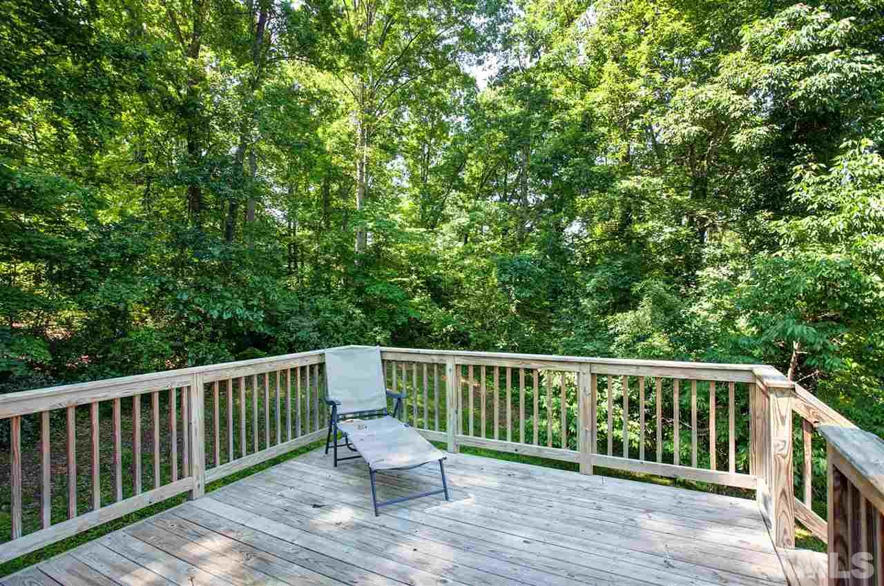 1145 Marlborough Road Raleigh, NC 27610 - Photo 15 of 17 a view of a wooden deck and a yard