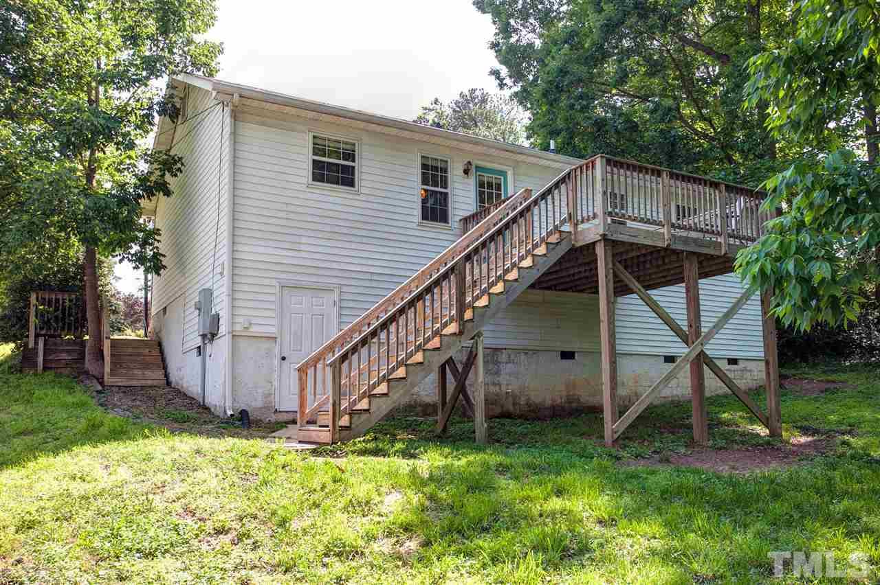 1145 Marlborough Road Raleigh, NC 27610 - Photo 16 of 17 a view of backyard with small cabin