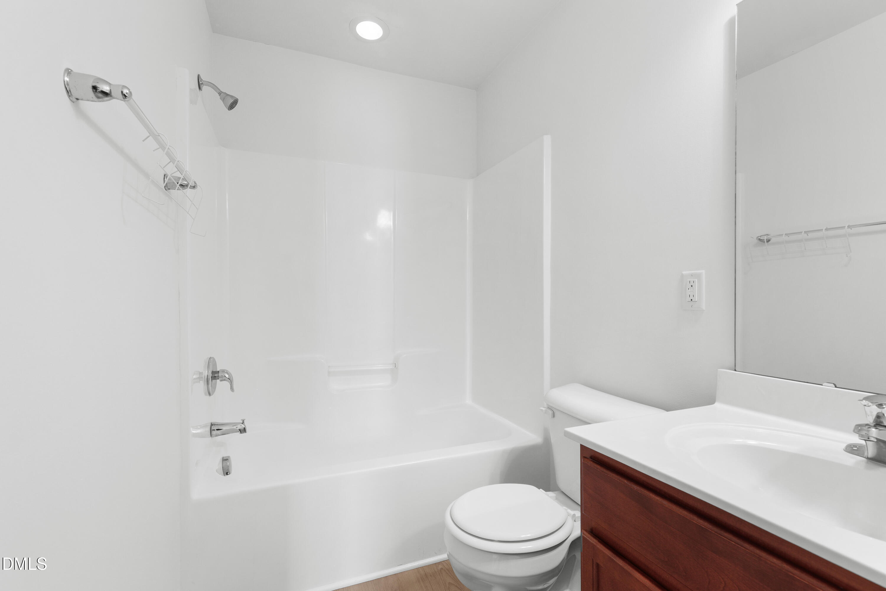 4400 Hillsgrove Road Wake Forest, NC 27587 - Photo 29 of 49 a bathroom with a sink a toilet and a bathtub