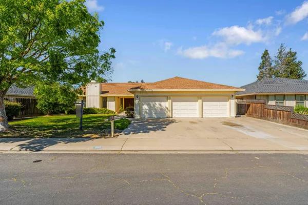 a view of house with outdoor space and street view