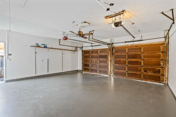 a view of a room with wooden walls