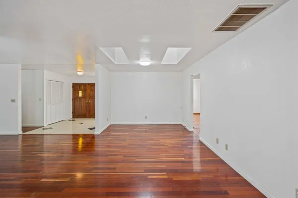 a view of an empty room with window