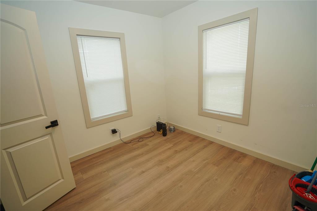 535 14th Avenue South, Unit W St. Petersburg, FL 33701 - Photo 9 of 15 an empty room with windows