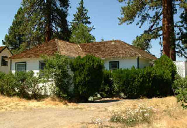 1951 Glenbrook Road Glenbrook, NV 89413 - Photo 2 of 3 a view of a house with a yard covered in snow