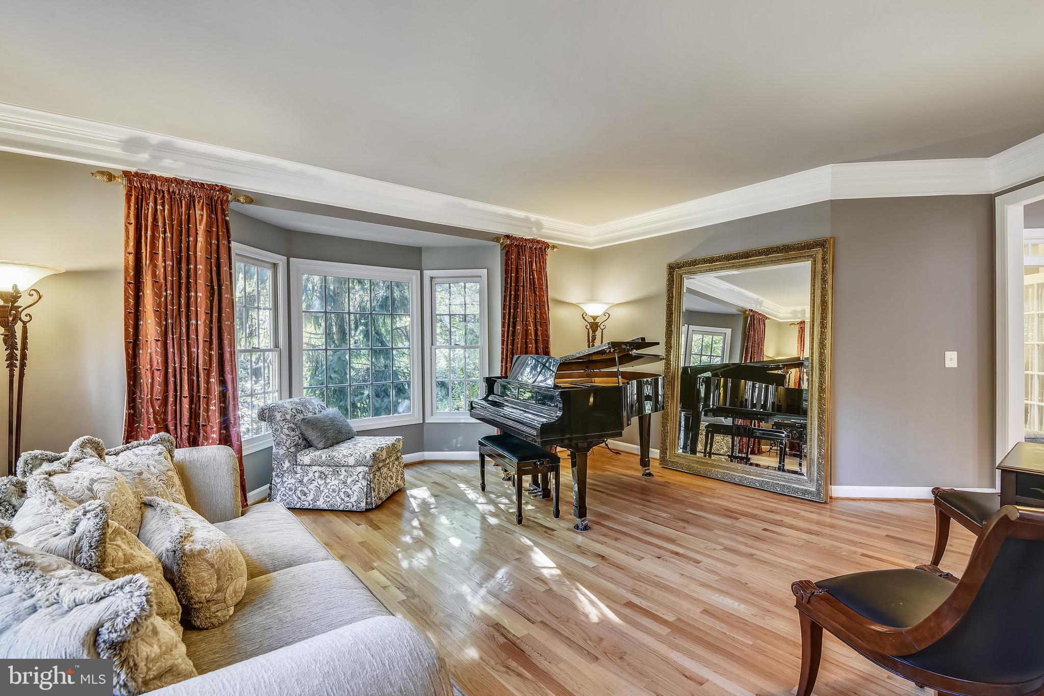 116 Chimney Ridge Place Sterling, VA 20165 - Photo 36 of 78 Living Rm: wall of windows & a bay for extra