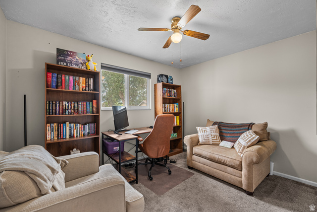 7659 State Street Midvale, UT 84047 - Photo 14 of 33 Bright room with neutral wall tones and textured ceiling