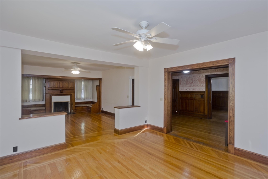 128 Maplewood Terrace Springfield, MA 01108 - Photo 16 of 40 a view of a livingroom with wooden floor and workspace