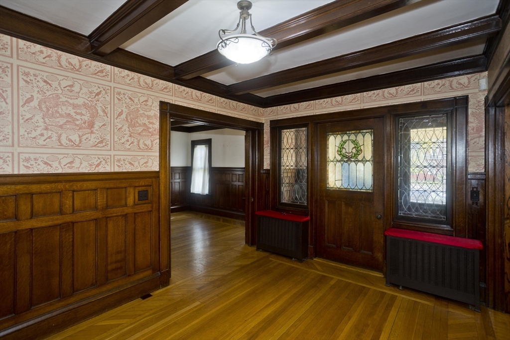128 Maplewood Terrace Springfield, MA 01108 - Photo 19 of 40 a view of hallway with a mirror and furniture